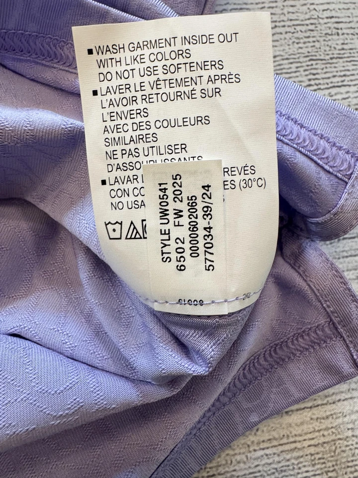 Camisa polo Under Armour para mujer mediana púrpura golf UPF 30 rendimiento elástico Foto 3 de 4