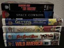 Warner Bros VHS Lot of Tapes Wizard Of Oz Space Cowboys & More Movies