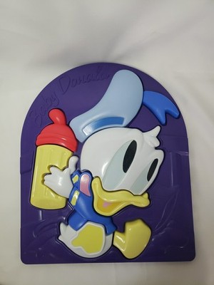 Vintage Disney's Baby Donald Duck Bottle Hard Plastic 3-D Puzzle Arco