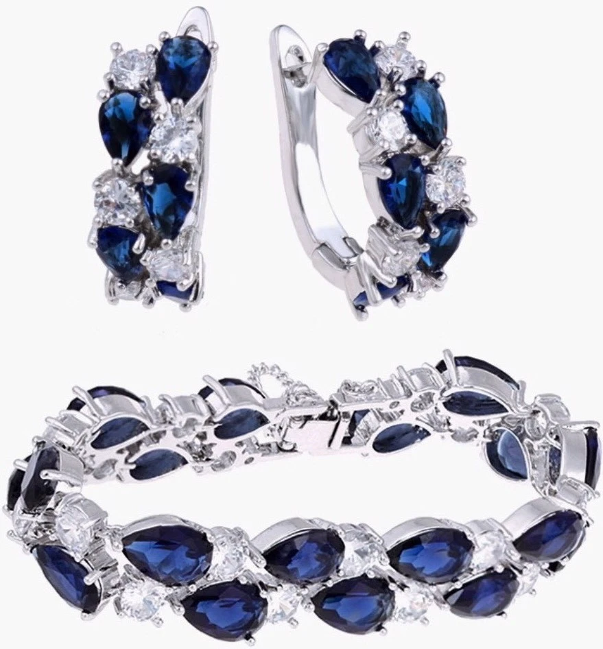 Juego de brazalete y pendientes de tenis de zafiro azul creado en laboratorio rellenos de oro blanco de 18k Foto 2 de 4