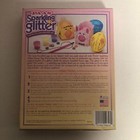 Vintage PAAS Glitter Egg Color Set with 3 glitter patches, pastel eggs, and instructions in yellow box.