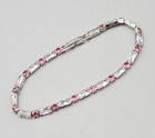 Round Pink Crystal 6.75" Silver Plated Tennis Bracelet Clear