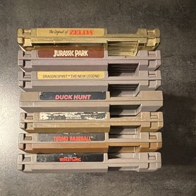 Nintendo NES Game Lot of 7: Zelda Gold, Jurassic Park, WCW, WWF, Duck Hunt