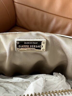Authentic Gianni Versace white quilted patent leather “snap out of