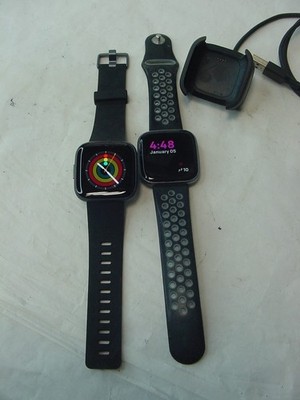 2 FITBIT WATCHES FB507 with 1 USB CHARGER