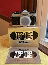 Nikon FE 35mm Film SLR Camera Body with Instruction Manual in Original Box
