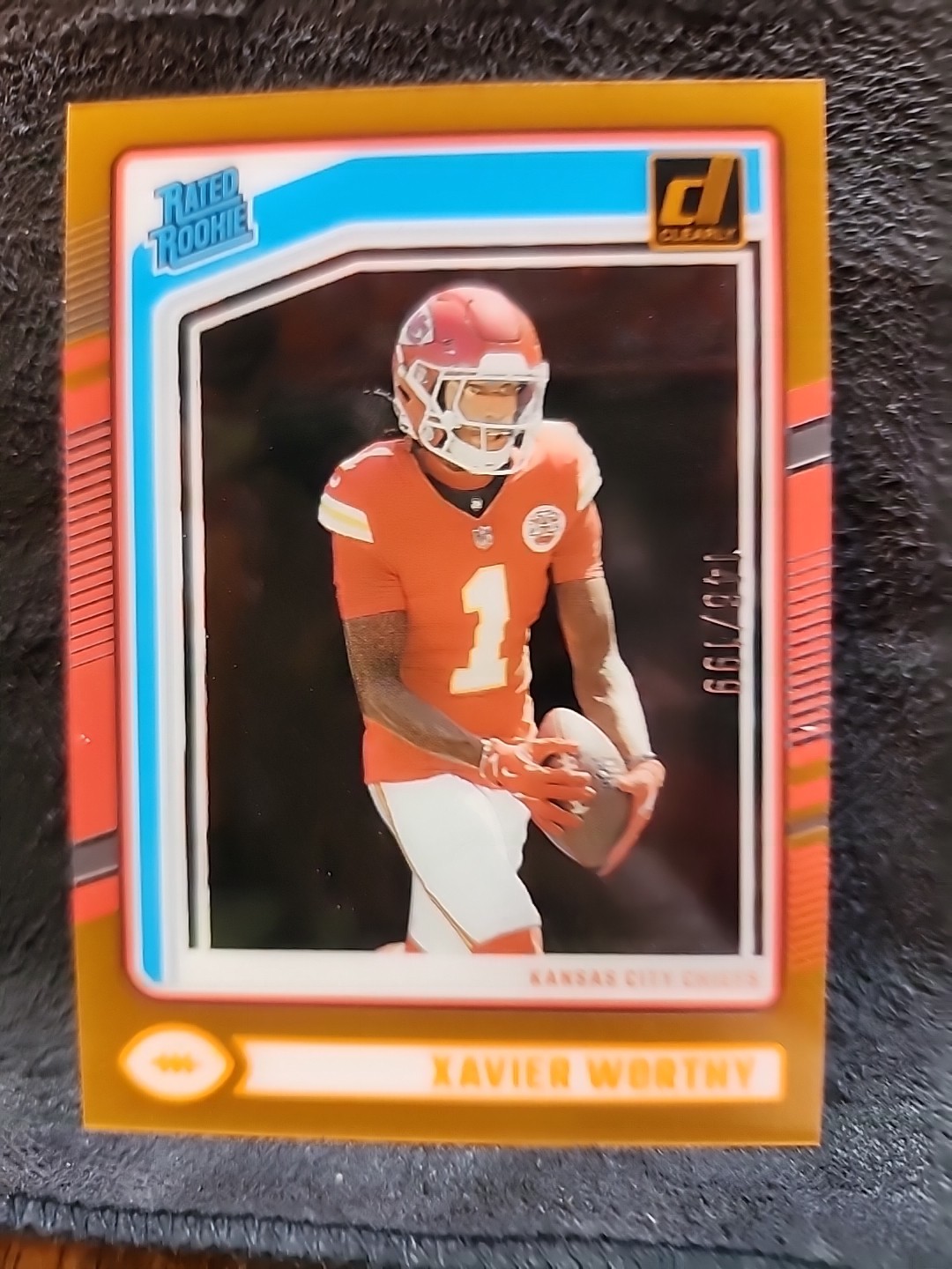 2024 Donruss Clearly Xavier Worthy Rated Rookie #/199 Orange