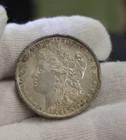1885  US Morgan Silver Dollar $1 XF (Cleaned, Retoned)