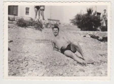 Carefree Shirtless Handsome Young Man Relaxing on the Beach Bulge Beach Gay Int