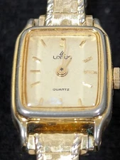 Lorus Gold Tone Dial Rectangle Case Textured Stainless Steel Stretch Band Watch