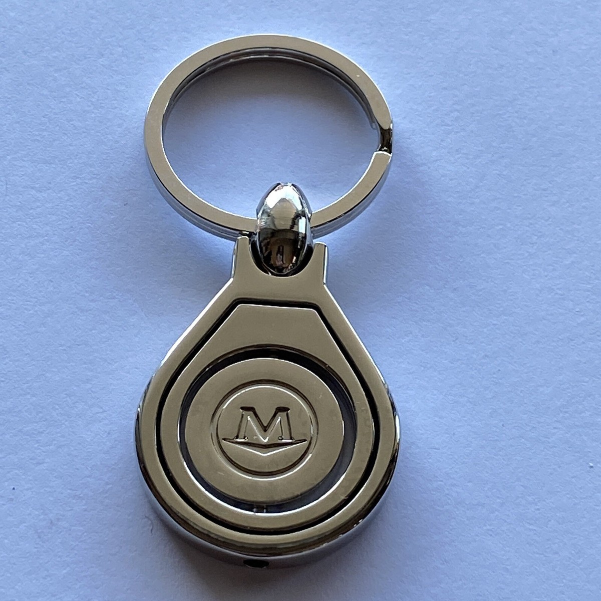 Pin Movado Chrome Spinner Keychain Heavy Good Condition | eBay