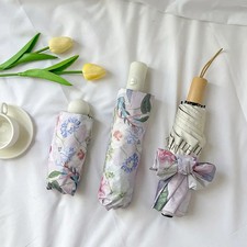 Retro oil - painting three - fold automatic black glue sun protection umbrella,