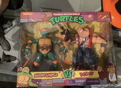 Teenage Mutant Ninja Turtles TMNT Playmates Michelangelo Vs Bebop 2-Pack NEW 