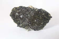 NWA 11788 Lunar  meteorite slice! Weight 1.55grams  1 inch (feldsp. breccia)