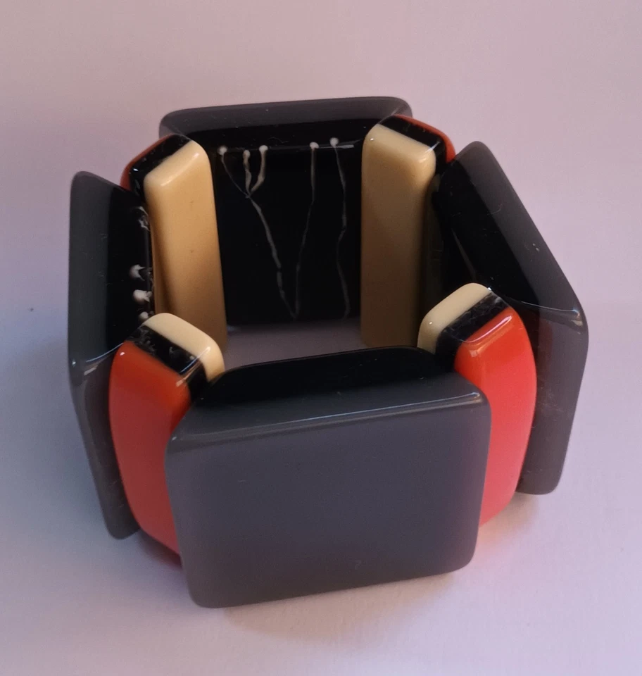 Juego de dos pulseras elásticas Marni en tonos grises y naranjas Foto 3 de 4