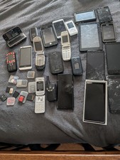 Assorted Used Cell Phones, Garmin GPS,Memory Chips,Etc.