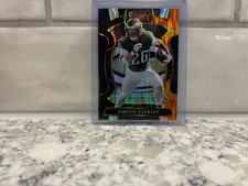 2025 Select FB Concourse Black / Orange Prizm Shock - Saquon Barkley Eagles # 90