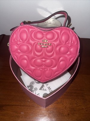Rose red heart shaped COACH bag