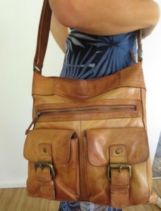 distressed leather crossbody bag