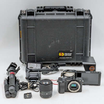 Sony A6400 4K Mirrorless Camera w/ 30mm Sigma Lens & Remote Tripod Set -Untested