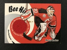 2003-04 UD Beehive #JT-17 Martin Brodeur Devils GAME-USED PATCH EX (Stain)