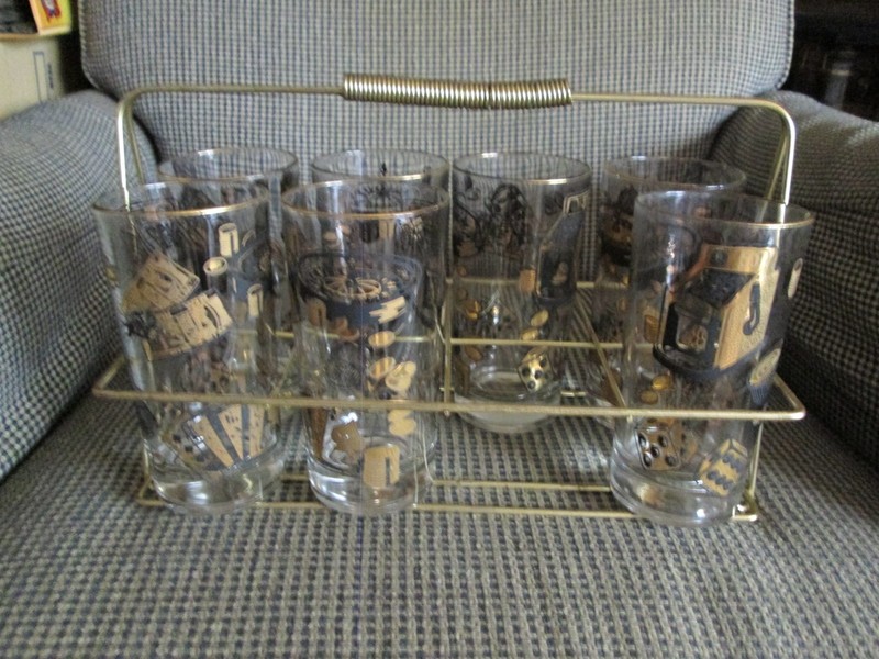1950's "Las Vegas" set of 7 highball glasses in a wire frame carrying rack