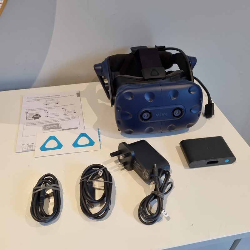 Boxed HTC Vive Pro VR Headset + link box and all cables. Perfect working order.
