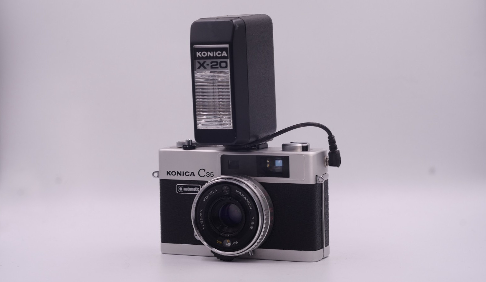 Konica C35 Automatic 35mm Film Camera with X20 Flash New Seals