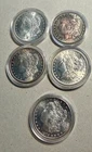 (5) Five Morgan U.S. SILVER DOLLARS: 1879-S, 1881-S, 1883-O, 1896-P, 1899-O BU