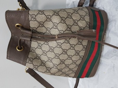 Gucci  GG  Supreme  Monogram Bucket Bag (Defect On  the  handle).