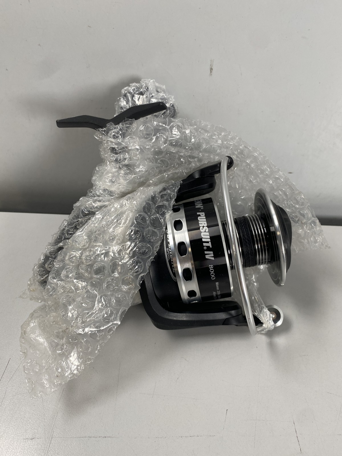 Penn Pursuit IV 8000 Ambidextrous Spinning Aluminum Fishing Reel in Black/Silver