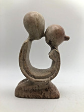 Hand carved abstract natural soapstone sculpture of kissing couple