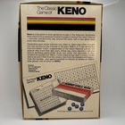 Vintage 1976 Classic Games Co. box with red-bordered KENO game board, red markers, and instructions for The Classic Game of KENO.