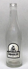 Vtg ACL Embossed Squeeze Sturgis Bottling Co Michigan Clear Soda Bottle 12 oz