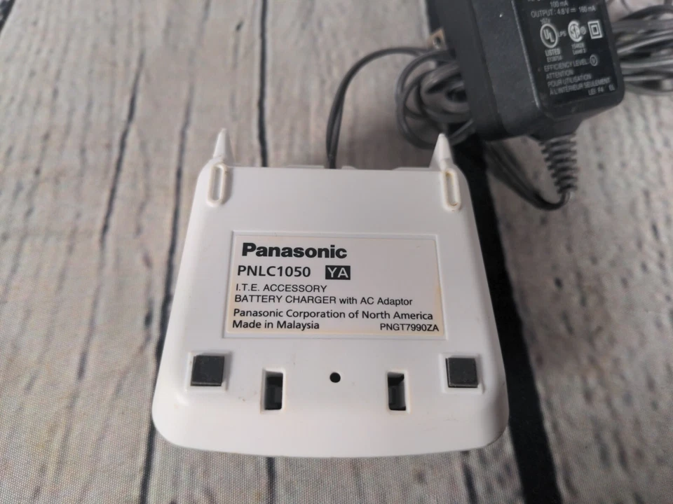 Panasonic PNLC1050 YA Base Cargador de Auricular de Repuesto con Adaptador de CA PNLV233 Foto 2 de 2