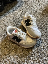 New Balance 237 toddler shoes black white and grey. Size 7 baby boy