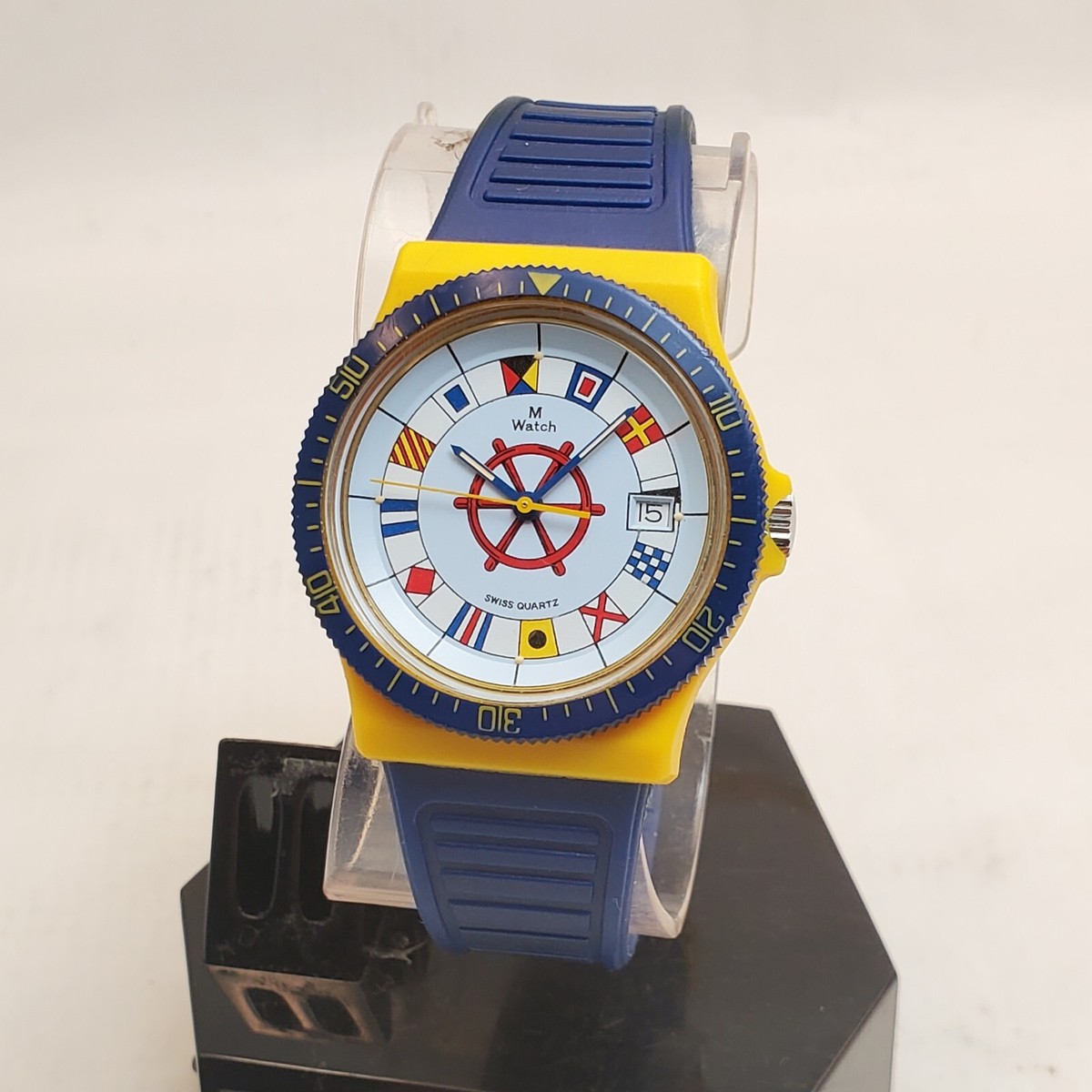 RARE MONDAINE M WATCH M-7606.550 SWISS QUARTZ FLAGS WATCH