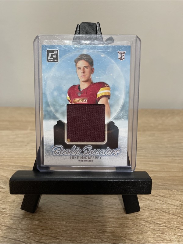 2024 Panini Donruss - Rookie Holiday Sweaters Luke McCaffrey #RHS-LMC (MEM, RC)
