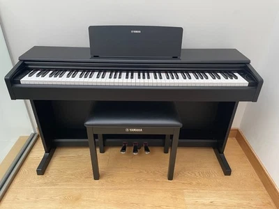 Yamaha Arius YDP-144 digital piano and stool in satin black stock #26296