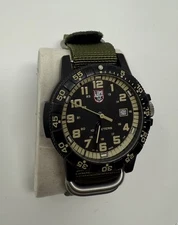 Quartz analog watch model number: 0320-1GBQ H-3 LX LUMINOX - Preowned