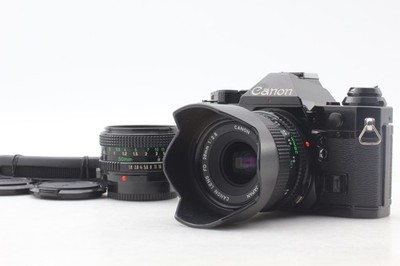 2 Objektive [NEUWERTIG+++ mit Haube] Canon AE-1 Program NFD 50mm F1.8 28mm...