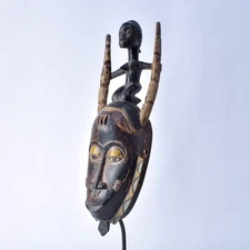 Guro House Mask with Figure Côte d'Ivoire
