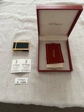 S.T. Dupont Briquet à gaz rechargeable métal noir et doré