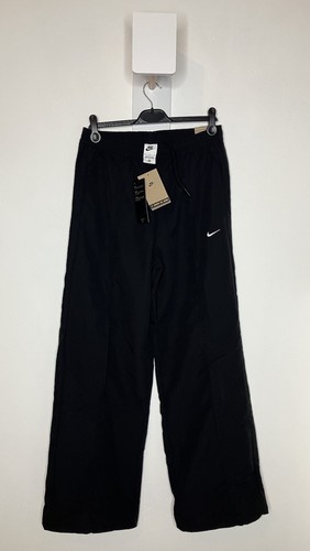 Pantalones Nike de doble altura dobladillo abierto mediano negro movimiento a cero - Imagen 1 de 7