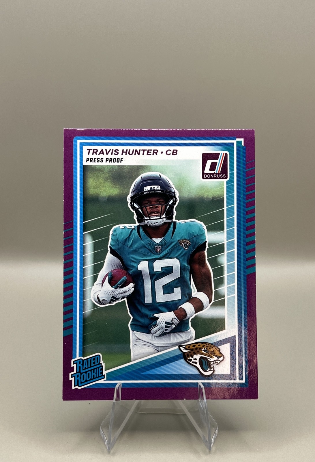 2025 Panini Donruss - Rated Rookie Travis Hunter #301 Purple Press Proof (RC)