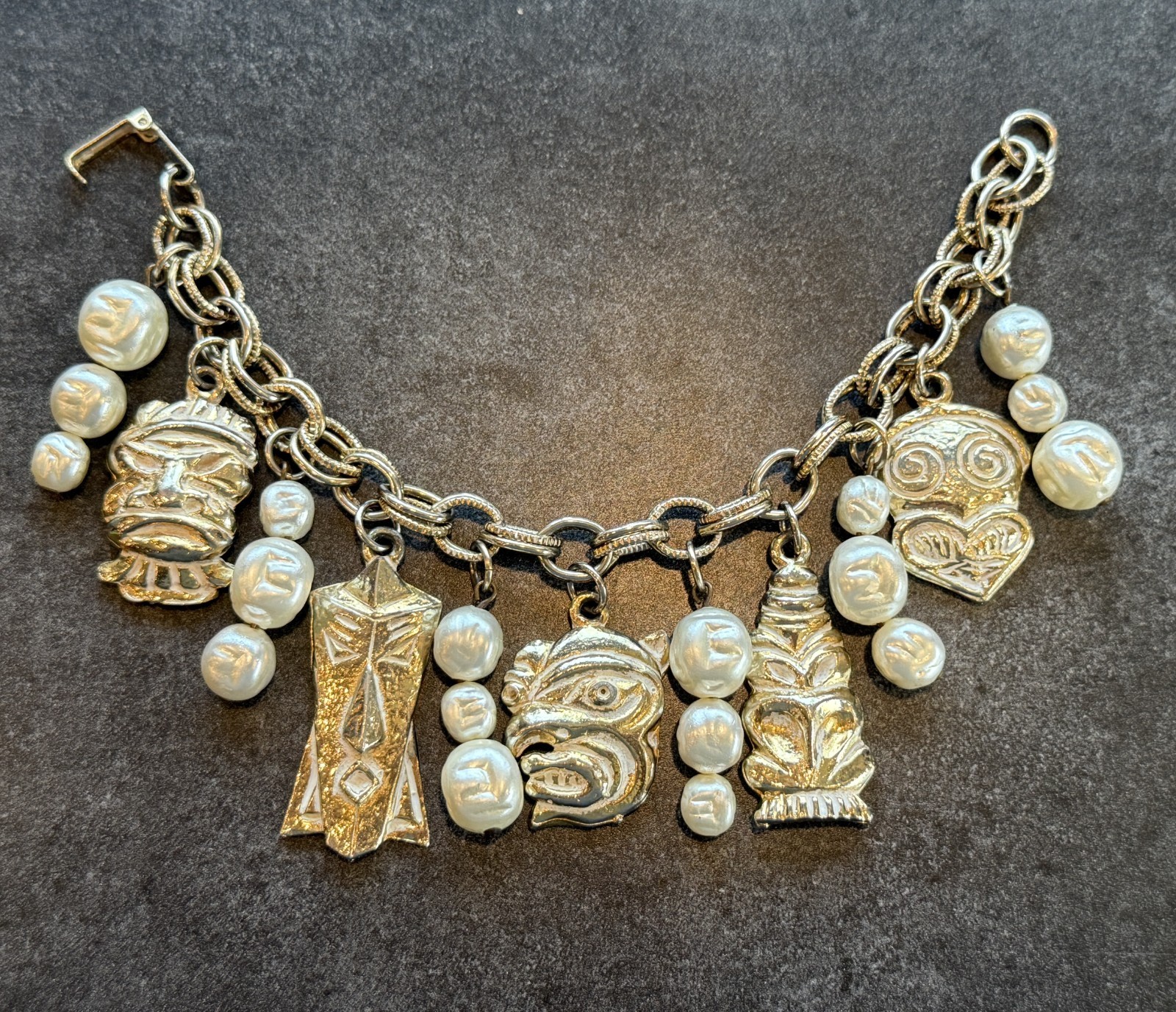 VTG Tiki Charm Bracelet with Stacked Faux Pearls in Gold Tone 7.25 Inches-image