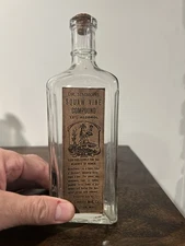 Circa 1915 Rectangular Elixir Bottle With Reproduction Label