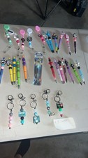 pens, keychains, retractable Badge Holders  