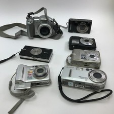 Lot of 7 Broken Digital Cameras Nikon, Sony, Kodak and Minolta No Power READ
