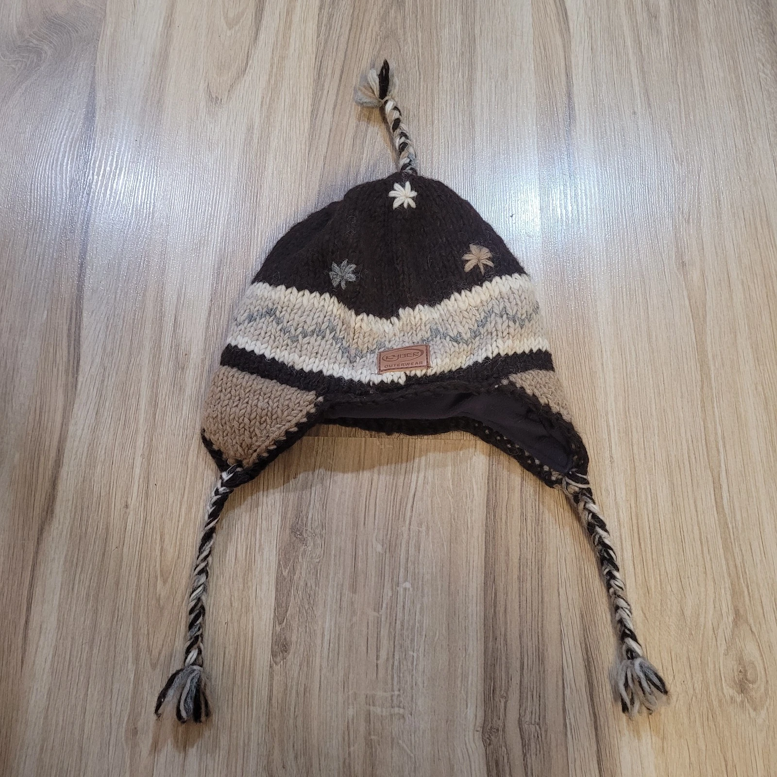 Kyber Outerwear Winter Hat Nepal Ear Flap 100% Wool Fleece Lined Brown Tassels